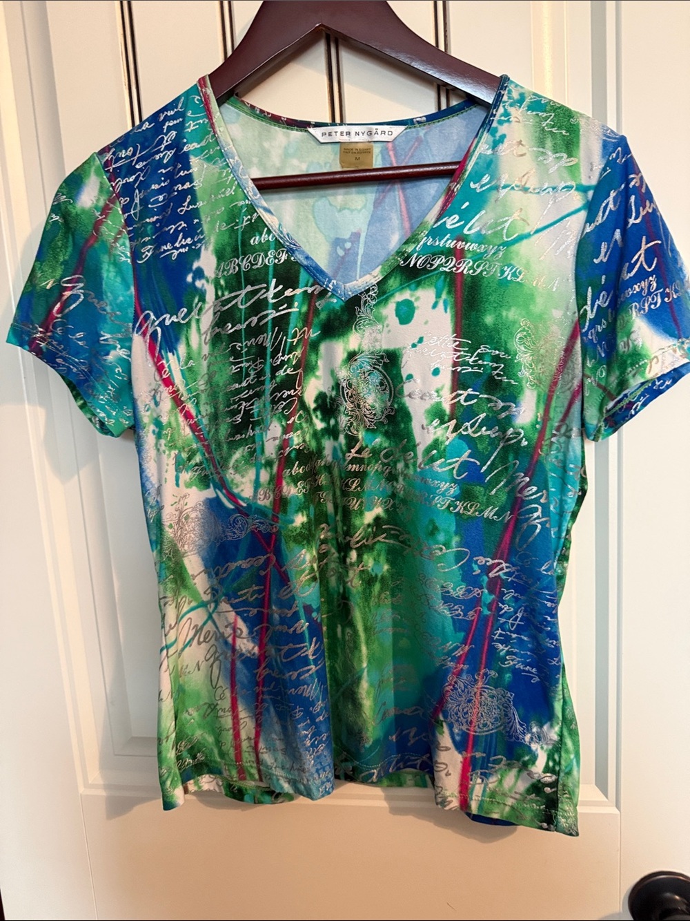 Peter Nygard Blue, Green V-Neck Tee, Silver Scripting. Excellent Ciondition.
